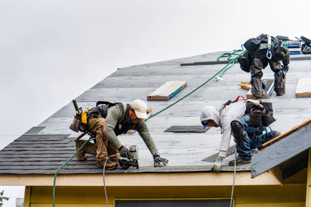 Professional Gutter Installation technician working in Redmond, WA